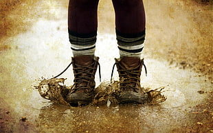 pair of brown leather boots, shoes, legs, mud, water