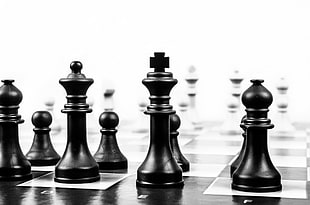 shallow photography of black chess pieces HD wallpaper