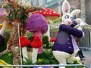 bunny near mushrooms flower arrangement at daytime