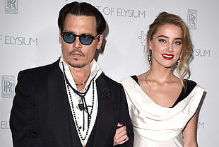 Johnny Depp beside woman HD wallpaper
