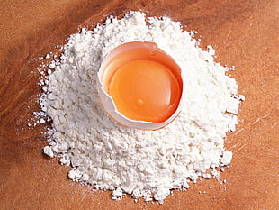 egg inside a white powder