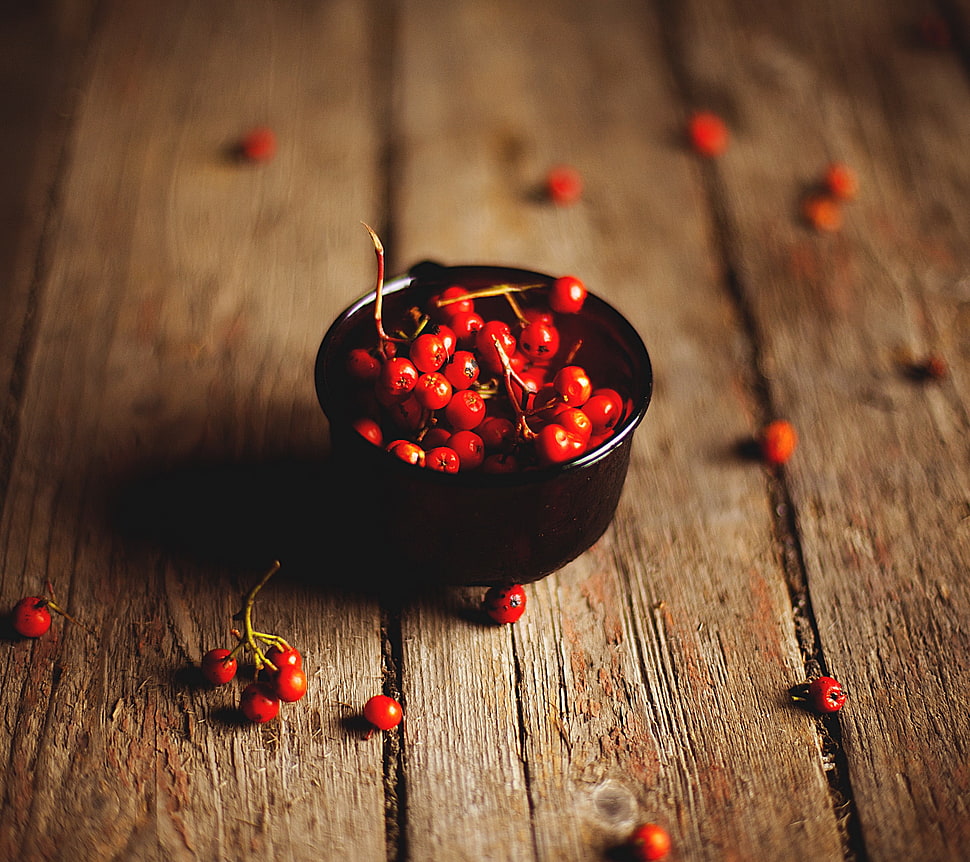 selective focus photo of bowl of cherries, wooden surface HD wallpaper