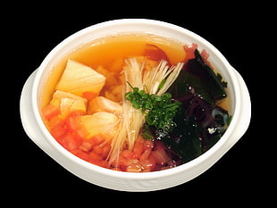 hotpot soup in white bowl
