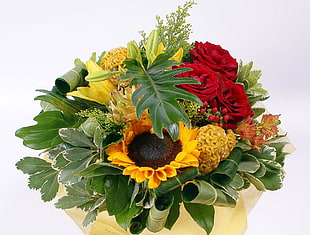 bouquet of sunflower, roses and yellow-brain shaped flower