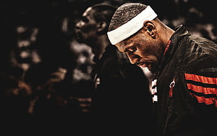 selective photo of LeBron James wearing Miami Heat jacket