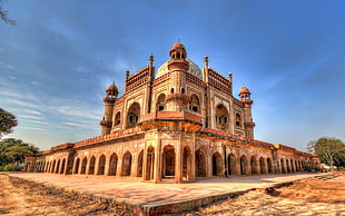architectural photography of brown mosque under clear sky during daytime HD wallpaper