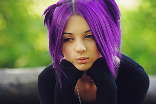 photo of woman wing purple colored hair