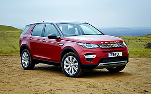 red Land Rover Discovery