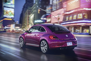 purple Volkswagen New Beetle timelapse photography