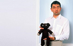 Rowan Atkinson holding Teddy