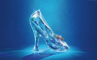 unpaired glass heeled shoe