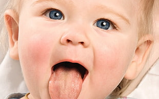 baby sticking tongue out HD wallpaper