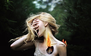 photo of woman's burning chest and shoulder