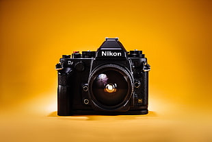 close-up photography of black Nikon SLR camera
