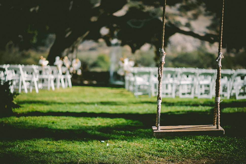 shallow focus photography of brown wooden swing HD wallpaper