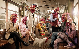 people wearing chicken head masks inside train during daytime