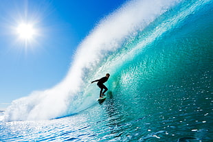 man playing surfboard on sea waves during daytime HD wallpaper