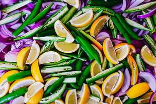 slices of citrus fruit, onions and lady's finger