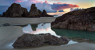 rock monolith, water, reflection, sunset, clouds