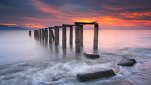 broken dock on body of water during dusk, sea, waves, sunset, clouds