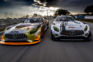 two Mercedes-Benz racing cars game poster