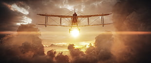 yellow monoplane surrounded by clouds HD wallpaper