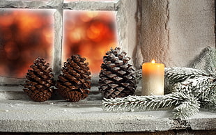 white and yellow candle, New Year, snow