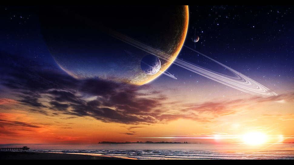 ocean during golden hour and planets HD wallpaper