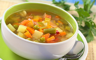 assorted slice vegetable soup in white ceramic bowl