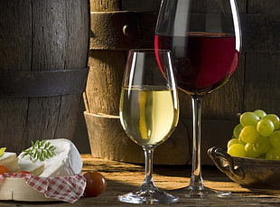 red and white wine glasses filled