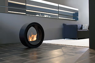 round black electric fireplace turned on