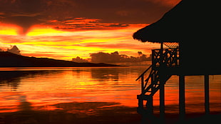 silhouette of nipa hut near ocean water during daytime, sunset, lake, sea, sunlight
