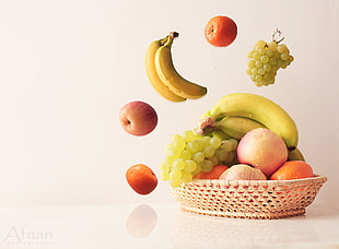 variety of fruits on woven brown basket