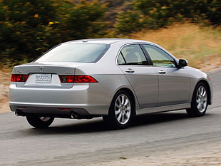 gray Acura TSX on gray road at daytime