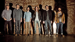 six person standing taking photo