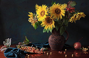 yellow sunflower on brown vase