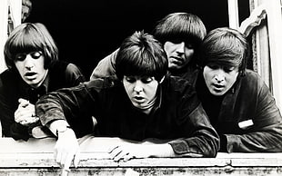 black and white photography of The Beatles