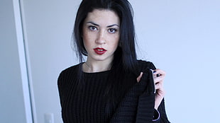 woman in black long-sleeved top
