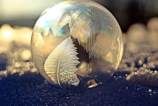 silver glass ball shallow focus macro shot