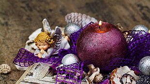 white ceramic angel figurine, Christmas ornaments , candles