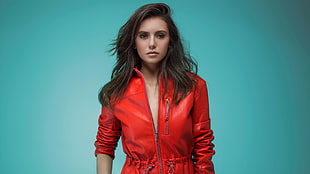 woman wearing red leather zip-up jacket
