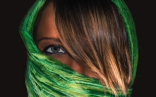 woman wearing green scarf