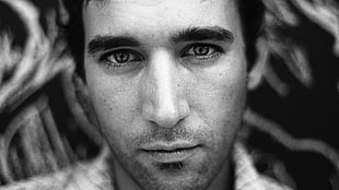 closeup photo and grayscale photography of a man in white collared top