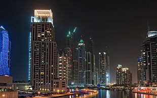landscape photo of city building during night time