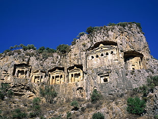 gray and brown concrete landmark cave, Phrygia, Turkey