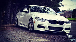 white BMW 5-series sedan