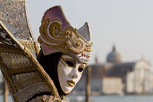 person in gold-colored costume at daytime