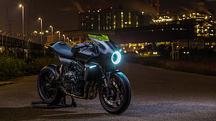 naked motorcycle on road during night time
