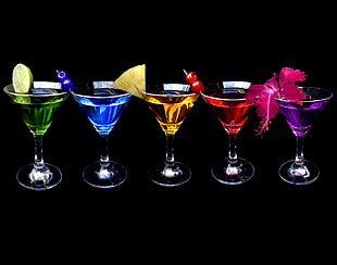 five cocktail glasses filled with assorted liquids HD wallpaper