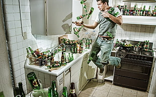 men's gray and white t-shirt, kitchen, beer, jumping